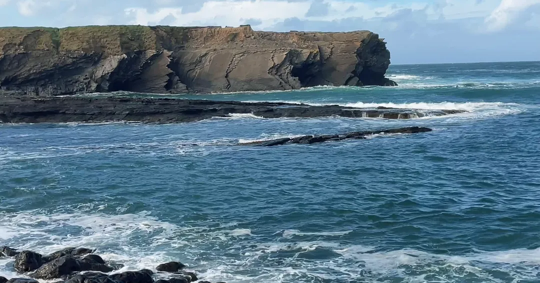 Atlantic waves breaking on the rocks of Derrynadivva Bay at Ross, Loop Head